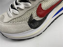 Sacai x Nike VaporWaffle "Sport Fuchsia Game Royal"