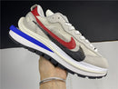 Sacai x Nike VaporWaffle "Sport Fuchsia Game Royal"