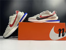 Sacai x Nike VaporWaffle "Sport Fuchsia Game Royal"
